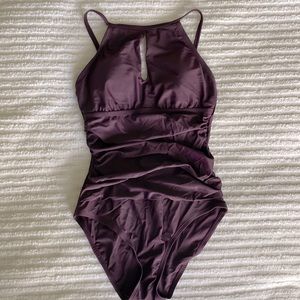 Flattering, plum bathing suit
